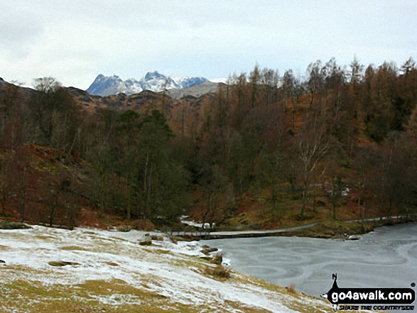 The Langdale Pikes from a frozen Tarn Hows