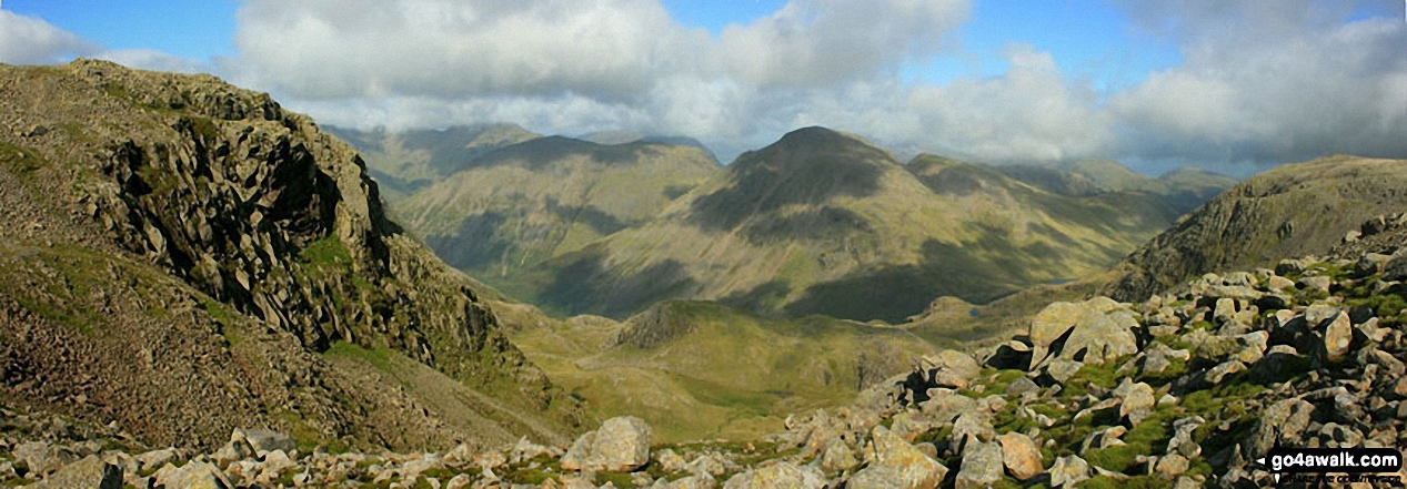 Walk c215 Scafell Pike from Seathwaite (Borrowdale) - A grand view overlooking the valley of upper Wasdale from Esk Hause with Pillar, Kirk Fell, Great Gable and Green Gable taking centre stage