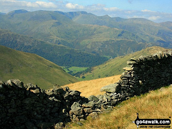 A break in the wall offers this view down towards Hartsop from the Straits of Riggindale