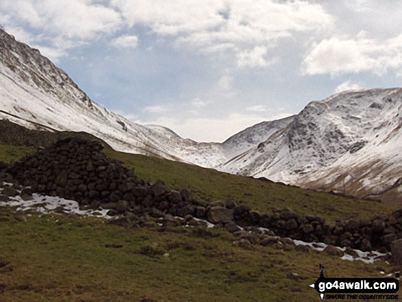 Walk c333 The Dovedale Round - Looking up to a snowy Threshwaite Mouth from Brothers Water