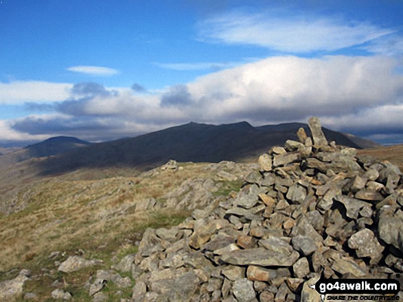 Walk c363 Caw (Dunnerdale Fells) Pikes (Caw), Green Pikes (Caw) and Walna Scar from Seathwaite (Duddon Valley) - White Maiden summit cairn with Grey Friar (left), Dow Crag, Brown Pike and The Old Man of Coniston (right) in the background