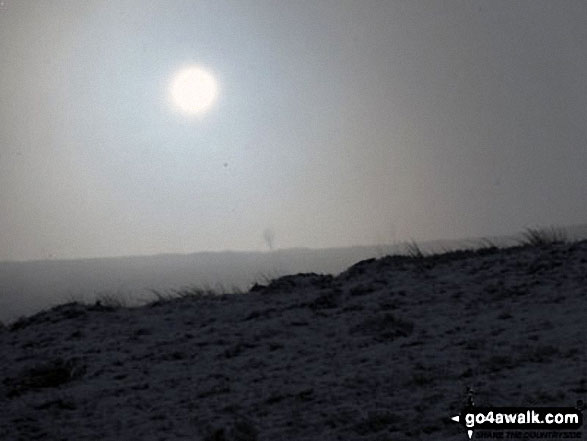 Walk wy102 West Buck Stones and Rombalds Moor (Ilkley Moor) from Ilkley - The sun breaking through over a snowy Ilkley Moor