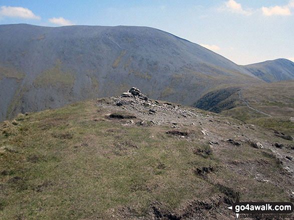 Walk c236 Skiddaw from Millbeck, nr Keswick - Long Side summit cairn with Skiddaw beyond