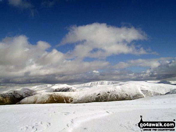 Walk c230 The Scandale Beck Horizon from Ambleside - Looking East to the snowy fell tops of Stony Cove Pike (Caudale Moor) and High Street from the summit of Little Hart Crag