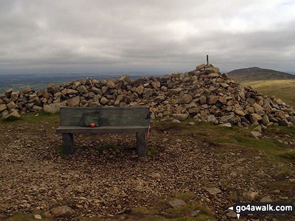 Walk c284 Great Sca Fell and High Pike from Fell Side - The cairn and bench on the summit of High Pike (Caldbeck)