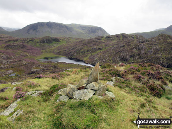 Walk c456 Fleetwith Pike, Hay Stacks, Brandreth and Grey Knotts from Honister Hause - Green Crag (Buttermere) summit cairn with Kirk Fell beyond