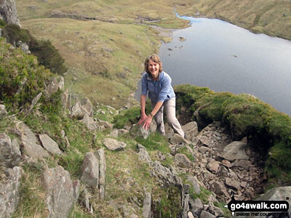 Me half-way up Jack's Rake with Stickle Tarn below