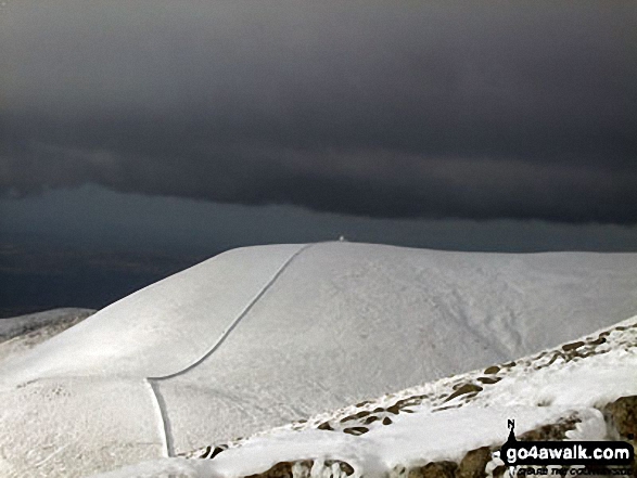 Slieve Commedagh with dark clouds threatening from the shelter on top from Slieve Donard (Sliabh Donairt)