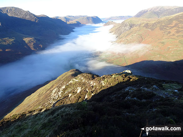 Walk c456 Fleetwith Pike, Hay Stacks, Brandreth and Grey Knotts from Honister Hause - Looking down Fleetwith Edge to a cloud inversion in the Buttermere valley from Fleetwith Pike