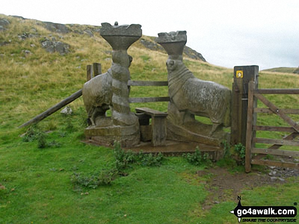 Unusual Sheep and Dove sculptured stile west of Holwick Scars