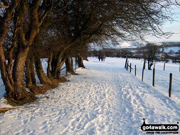 Walking along Castleon Road in deep snow north west of Hope