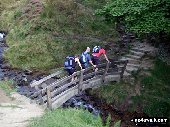 Crossing the footbridge over Grinds Brook near Edale