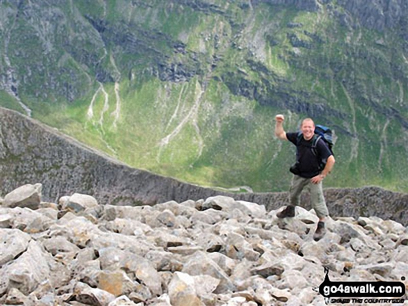 Approaching Ben Nevis summit via the SE shoulder on a clear day with Carn Mor Dearg (CMD) Arete in the background