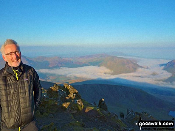 Walk gw158 Garnedd Ugain, Snowdon, Moel Cynghorion, Foel Gron and Moel Eilio from Llanberis - My son in law Mark waking up on the top of Snowdon with fabulous clouds down below