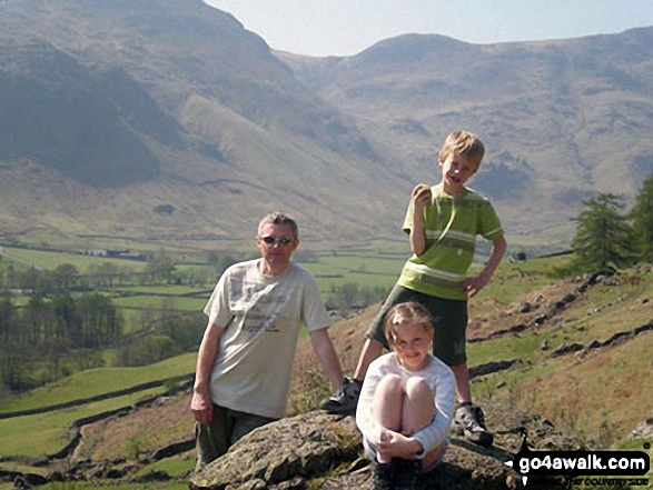 Walk c418 The Langdale Pikes via North Rake and Rossett Pike from Great Langdale - My husband and children at Stickle Tarn, Great Langdale