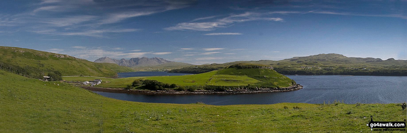 Gesto Bay and Loch Harport from the entrance to Loch Beag with The Cuillin Hills in the distance