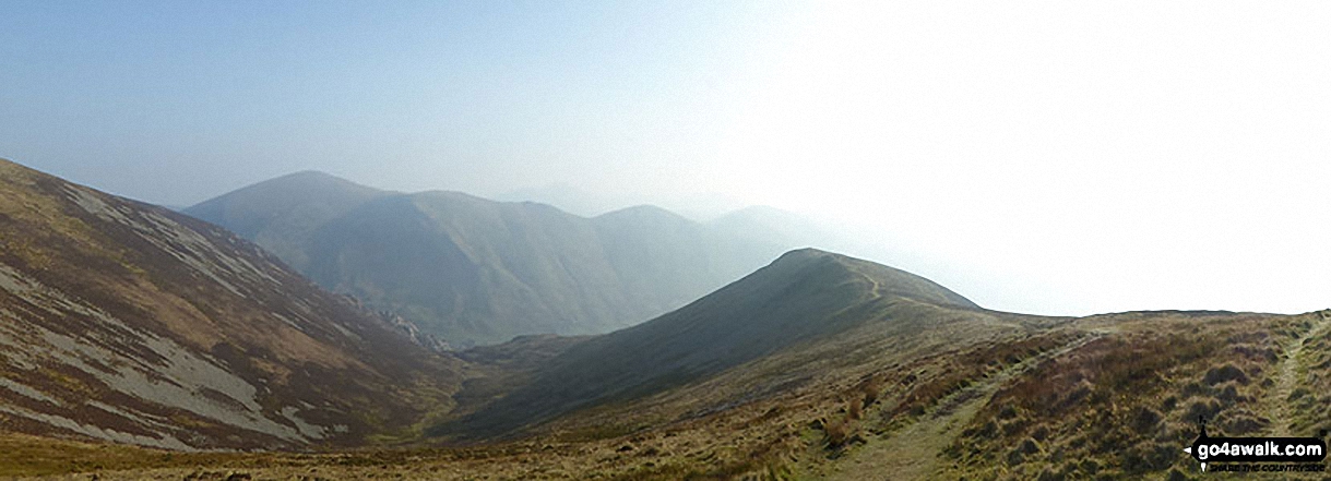 Moel Eilio, Foel Gron and Foel Goch (Snowdon) in the distance with Mynydd Mawr (Llyn Cwellyn) (left), Cwm Planwydd and Foel Rudd (Mynydd Mawr) (right) from Craig y Bera