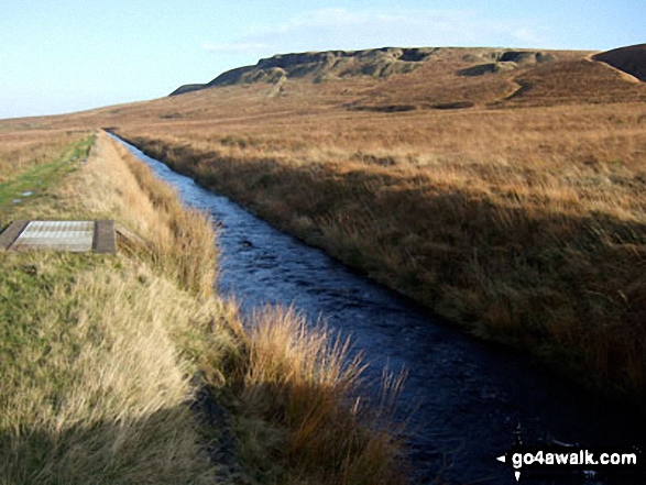 The (now suddenly full) Drainwater Ditch on Binn Moor with Shooters Nab beyond