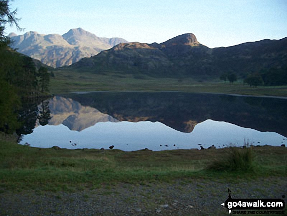 Walk c303 Swirl How and Wetherlam from Little Langdale - Busk Pike and The Langdale Pikes beyond Little Langdale Tarn from near Slater Bridge Bridge, Little Langdale