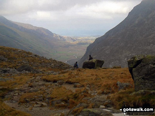 Looking down Nant Ffrancon to Bethesda with Anglesey in the far distance from near Llyn Bochlwyd in the Ogwen valley