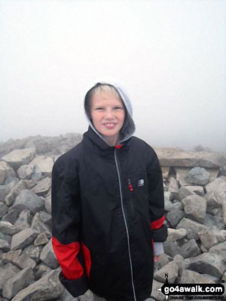 Walk c215 Scafell Pike from Seathwaite (Borrowdale) - My son on his first boys mountain climb up Scafell Pike with his Dad and Grandad