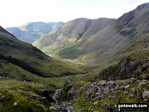 Walk c454 Scafell Pike via The Corridor Route from Seathwaite (Borrowdale) - Kirk Fell and the shoulder of Great Gable (right) with the lower slopes of Great End (left) and Red Pike (Wasdale) in the distance from Sty Head