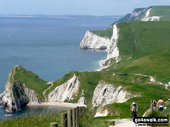 Durdle Door (bottom left) and Bat's Head (centre) with Weymouth beyond from St Oswald's Bay, The South West Coast Path