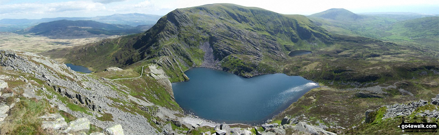 Llyn Hywel below Y Llethr with Cadair Idris (in the distance centre left), Moelfre (Rhinogs) (in the distance centre right) and Cwm Nantcol from the summit of Rhinog Fach