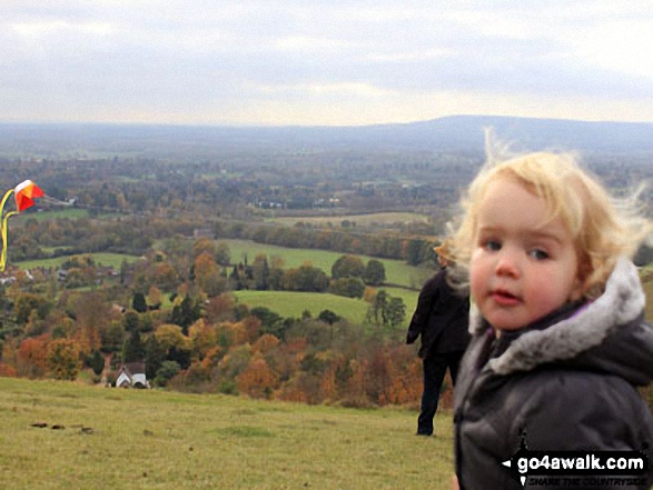 Go Fly a kite: My daughter, Tilly, watching in wonder at her daddy (try) to fly a kite on (a not so windy) Reigate Hill!