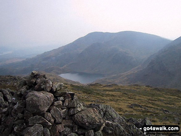 Walk c303 Swirl How and Wetherlam from Little Langdale - Levers Water and The Old Man of Coniston from Black Sails summit cairn