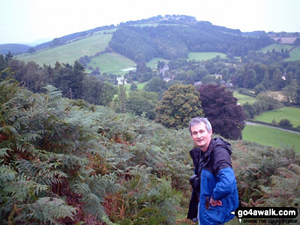 My husband Mark climbing Hopesay Hill with Burrow (Shropshire) in the background