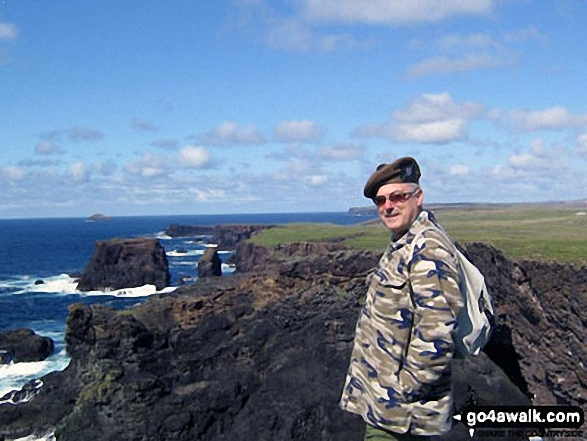 On the edge of the beautifully wild cliffs at Esha Ness