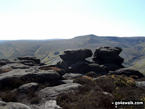 Walk d108 Edale Moor (Kinder Scout) and Crookstone Knoll (Kinder Scout) from Edale -  Rock sculptures near Ringing Roger on the edge of The Kinder Plateau (Edale Moor) with Grindsbrook Knoll beyond