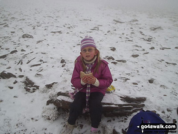 My daughter Ffion (aged 8) on the summit of Pen y Fan