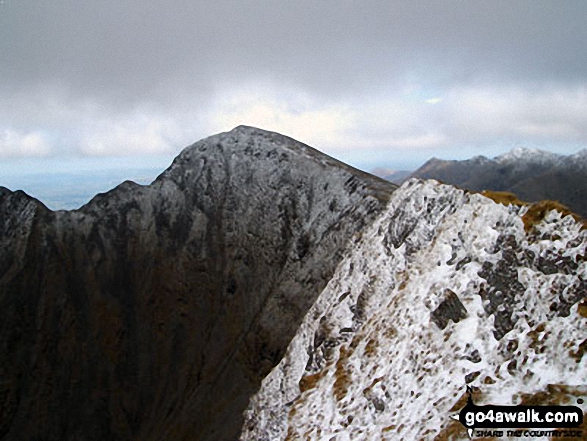 Looking along the second of the 3 summits on Caher towards Carrauntoohill<br>
MacGillycuddys Reeks<br>
County Kerry,