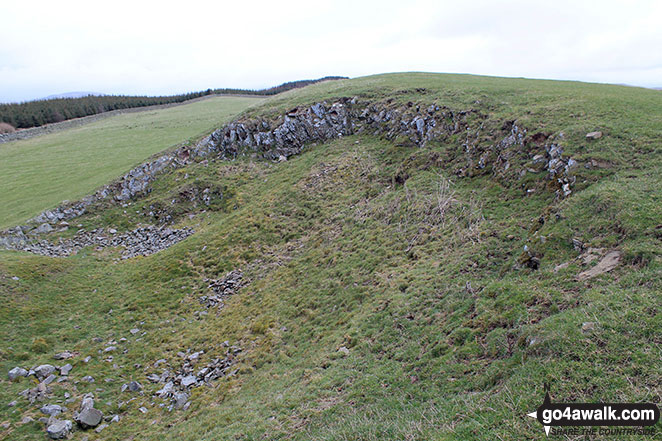 Rocky outcrop on Watch Hill (Cockermouth) with Setmurthy Common (Watch Hill) in the distance