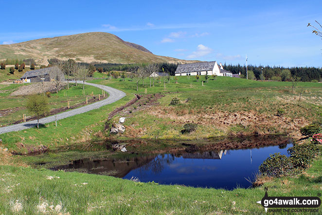 Walk dg126 Cairnsmore of Carsphairn from Craigengillan - The buildings at Soms Knowe with Moorbrock Hill beyond