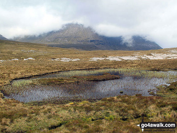 Sail Gharbh (Quinag) reflected in a pool from the lower slopes of Spidean Coinich (Quinag)