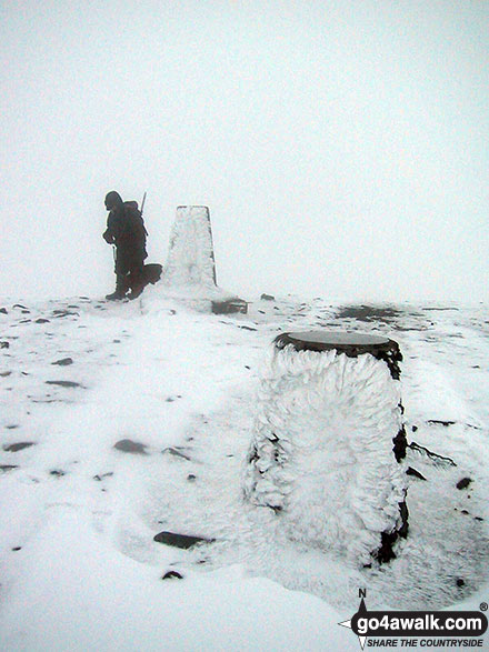 Walk c273 Skiddaw and Bakestall from Gale Road (Underscar) nr Keswick - The trig point and viewpoint indicator on the summit of a very cold and snowy Skiddaw