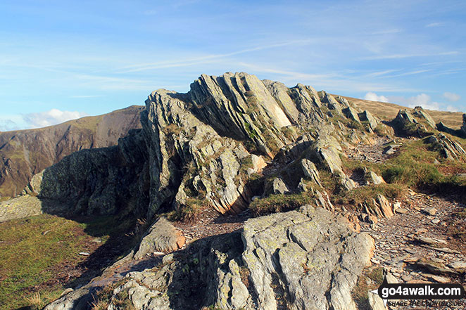 Walk c456 Fleetwith Pike, Hay Stacks, Brandreth and Grey Knotts from Honister Hause - The rocky outcrop on the summit of Honister Crag (Black Star)