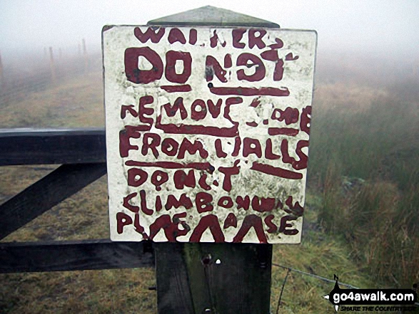 Sign in the lay by on the A6 at Demings Moss south of Shap