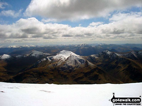 The glorious view south to The Mammores from the top of Ben Nevis - with the snow topped Stob Chiore a' Mhail prominent in the middle of the picture