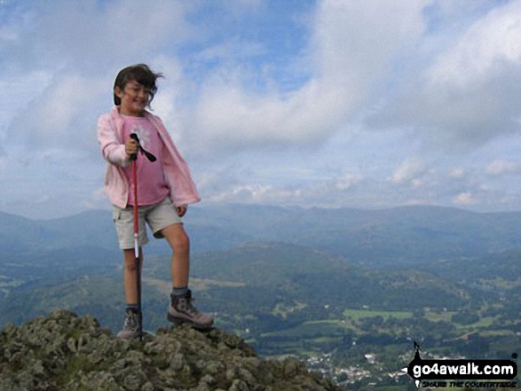 My daughter on Wansfell Pike in The Lake District Cumbria England