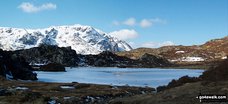 Walk c456 Fleetwith Pike, Hay Stacks, Brandreth and Grey Knotts from Honister Hause - Snow on Scafell Pike and the Scafell Massif from a very frozen Innominate Tarn