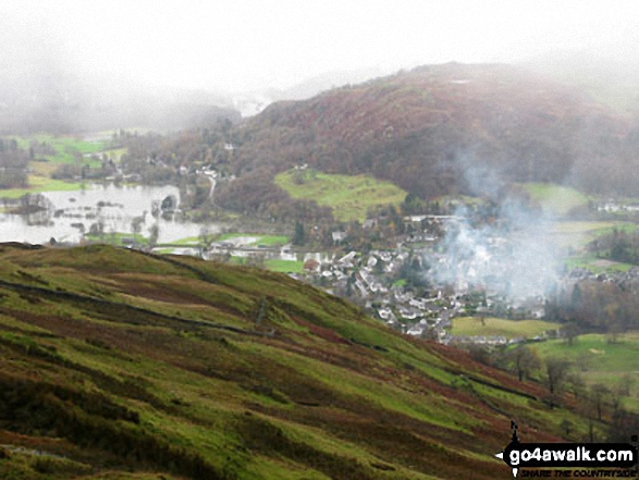 Walk c455 Wansfell Pike from Ambleside - Winderemere reaching into the town of Ambleside (and cutting it off) from Wansfell Pike