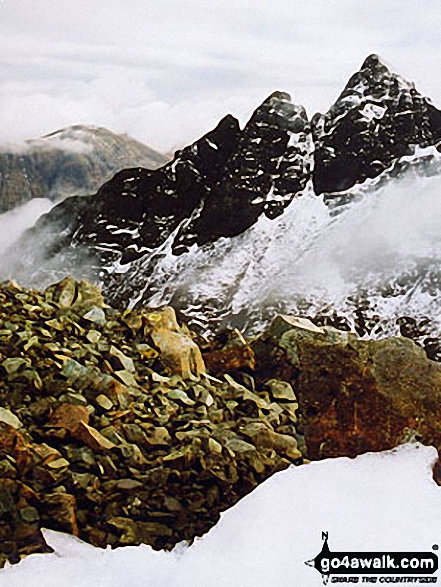 Mist blowing into corrie a Bhasteir below the impressively intimidating Pinnacle Ridge of Sgurr nan Gillean