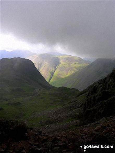 Walk c172 Scafell Pike via The Corridor Route from Wasdale Head, Wast Water - Lingmell (left) and Kirk Fell in sunlight from near Dropping Crag below Scafell Pike