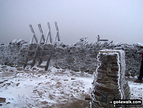 Walk ny101 The Yorkshire Three Peaks from Horton in Ribblesdale - Pen-y-ghent summit in snow