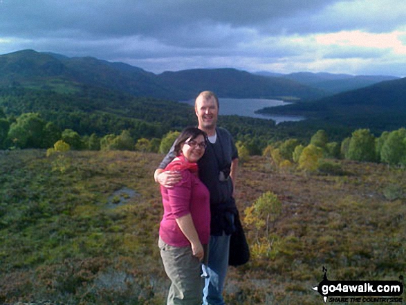 My husband and I on Cnoc Dubh (with Loch na Croic in the background) above Strathpeffer in the Scottish Highlands