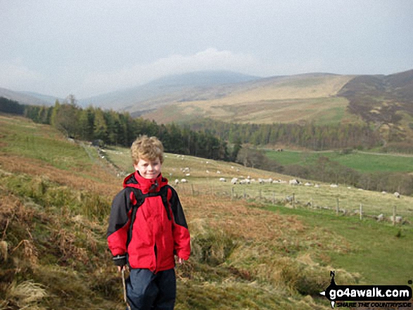 James on Hedgehope Hill with The Cheviot in the background